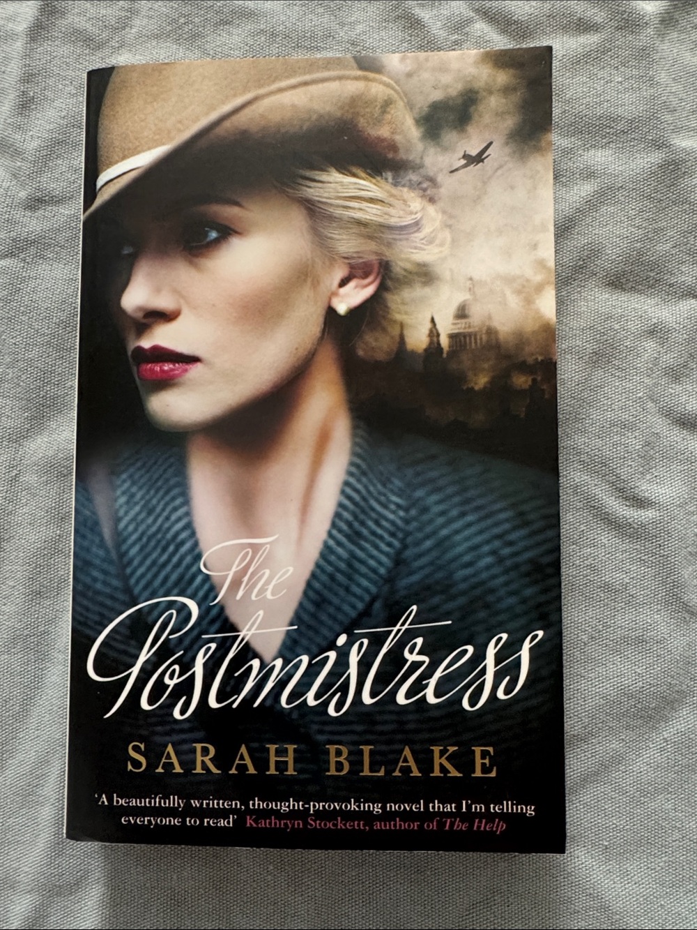 The Postmistress by Sarah Blake - Book with Dramatic Cover Art